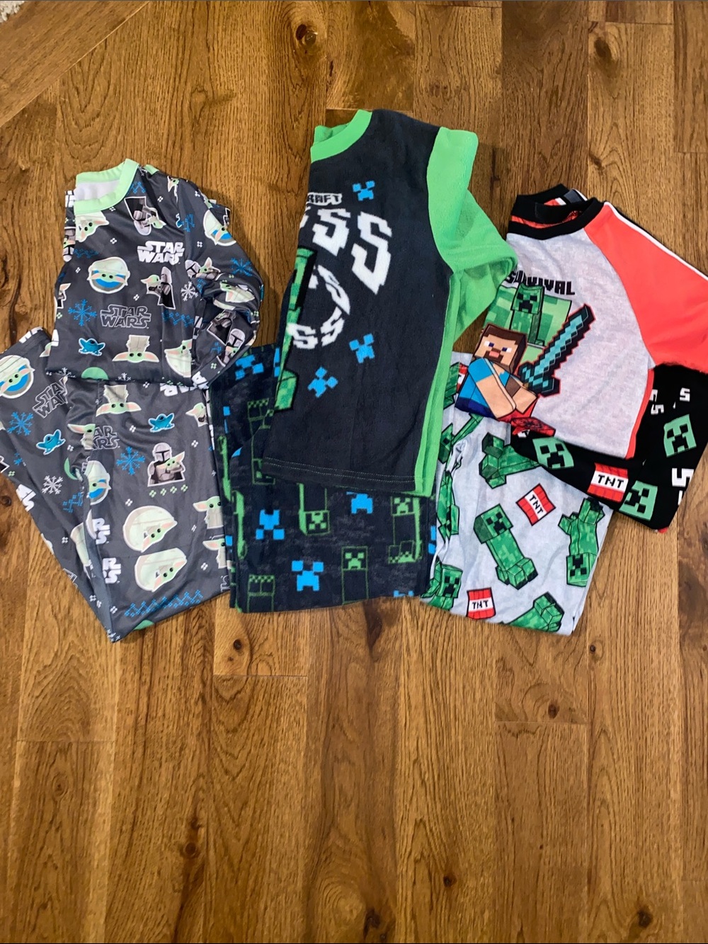 Three pairs of boys size 8/medium new pajamas.